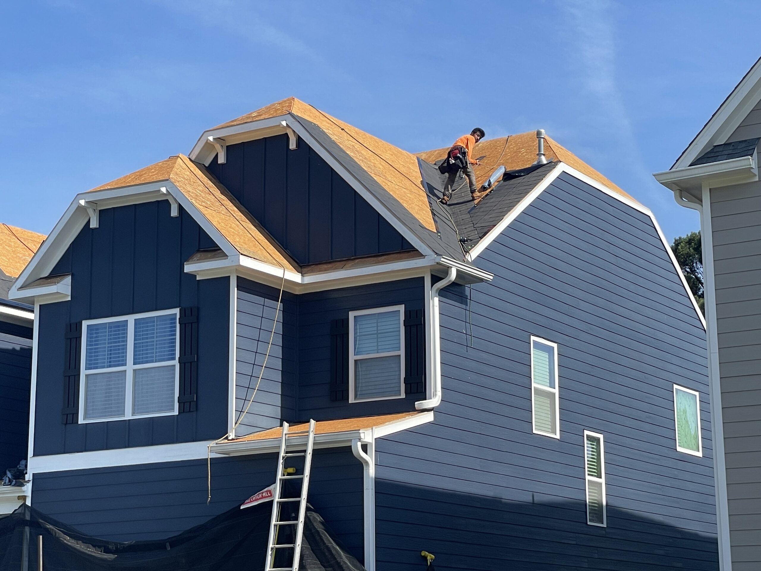 Tear-off and underlayment installation in progress on the Rialto Way roof
