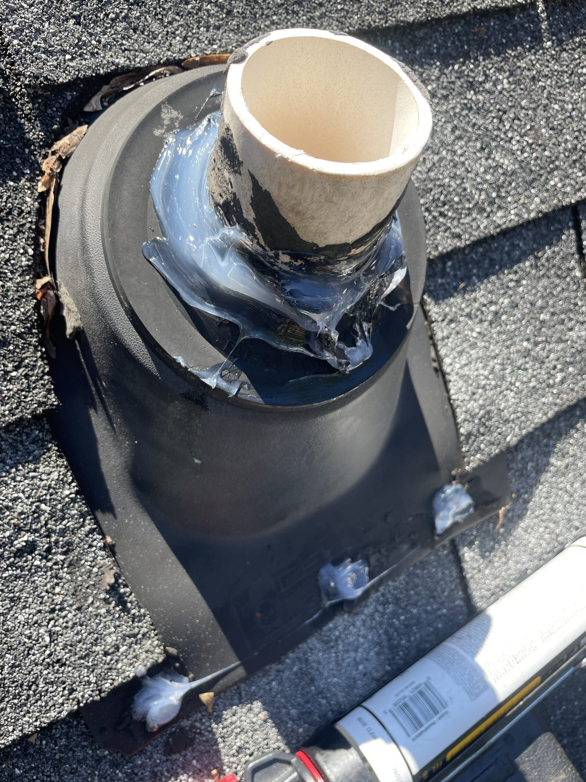 Exposed roof nail head sealed to prevent a future leak