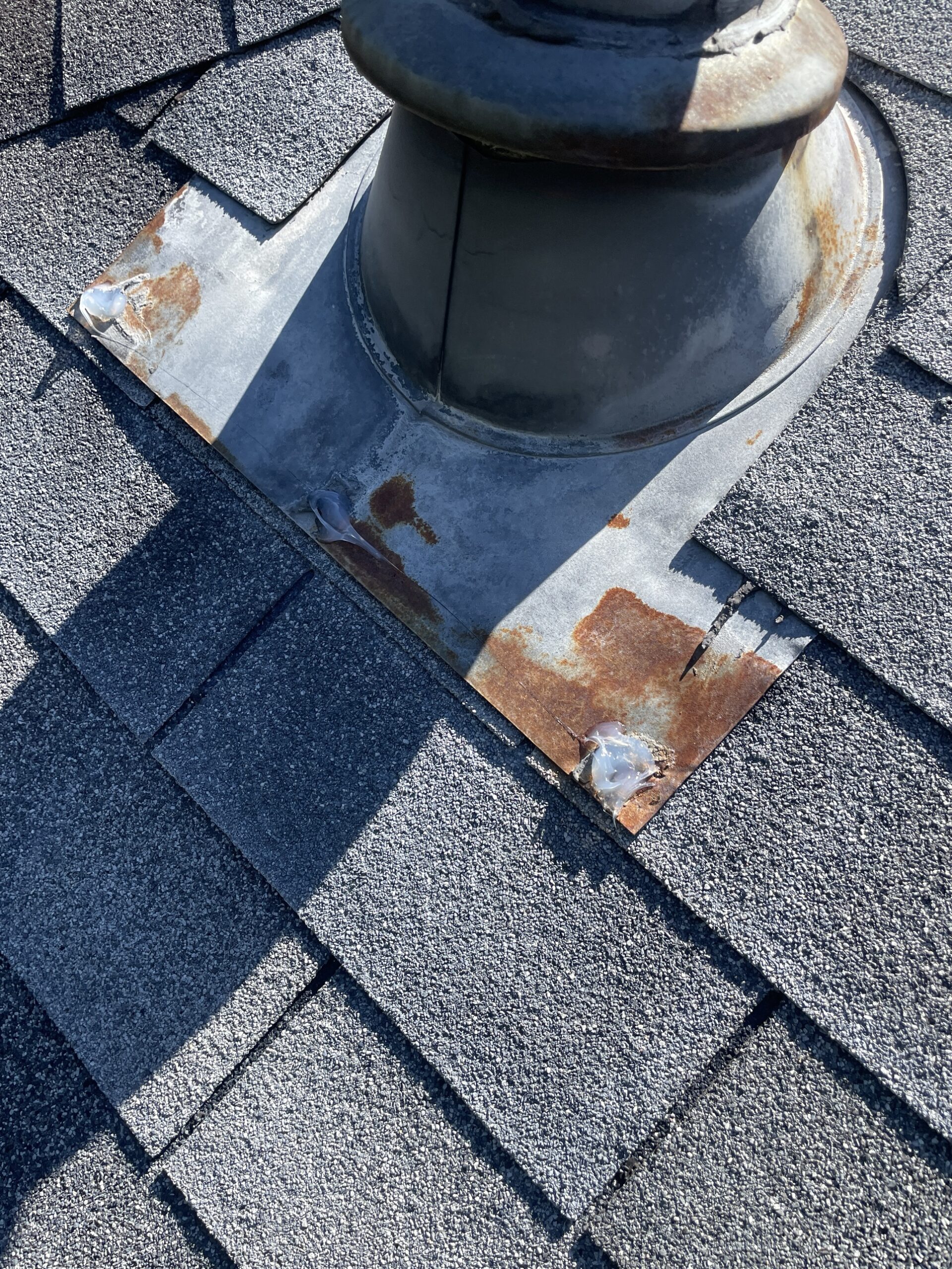 Roof pipe boot resealed to prevent a future leak